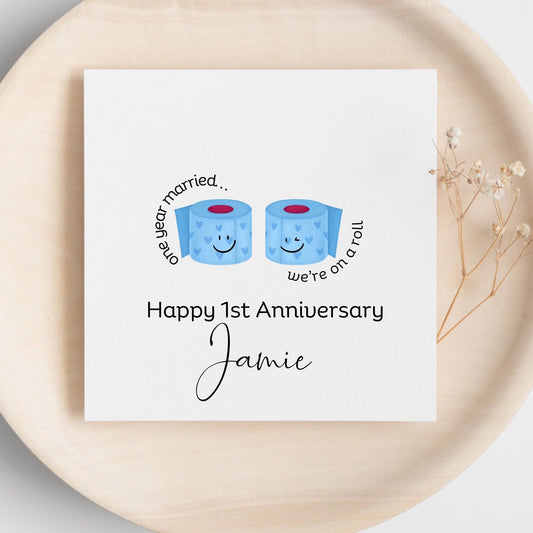 Funny 1st anniversary card, paper wedding anniversary card for wife or husband on one year married, we’re on a roll